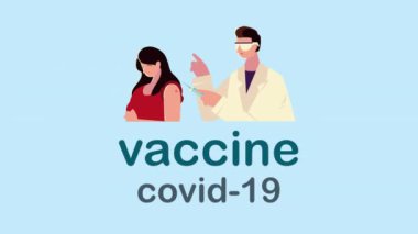 Aşısı olan erkek doktor ve küçük kadın hasta.