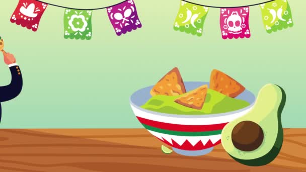 Mariachi mexicano jugando maracas con nachos en guacamole — Vídeos de Stock