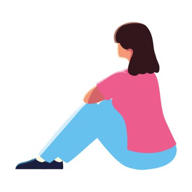 Kız yerde oturuyor.