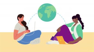 Dünya gezegenli dizüstü bilgisayar kullanan genç kızlar.