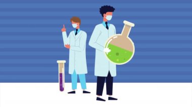 Tüplü iki bilim adamı laboratuvar çalışanı