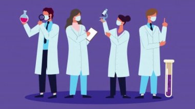 Ekip bilim adamları tüp testleriyle laboratuvar çalışanları