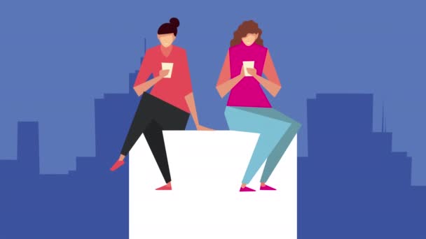 Meninas sentadas usando personagens de smartphones — Vídeo de Stock