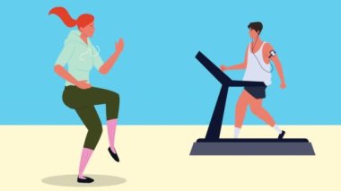 çift yürüyüş makinesinde egzersiz yapıyor.