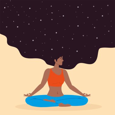 Kadın lotus pozisyonunda oturuyor.