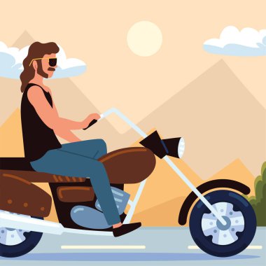 Klasik motosiklete binen adam.