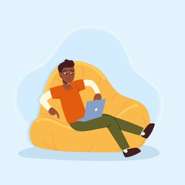 man sits on bean bag with