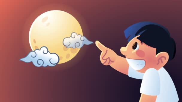 Cute little boy indexing the moon — Stock Video