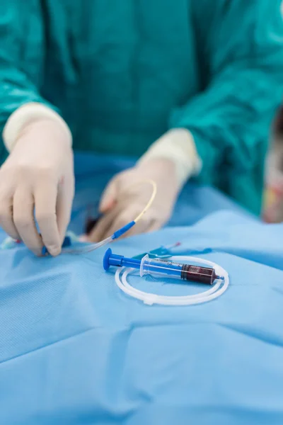 Doctor insert double lumen catheter — Stock Photo, Image