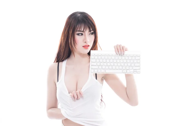 Asian woman hold wireless keyboard — Stock Photo, Image