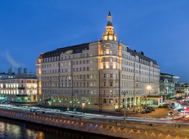 Hotel Baltschug Kempinski at dusk. clipart