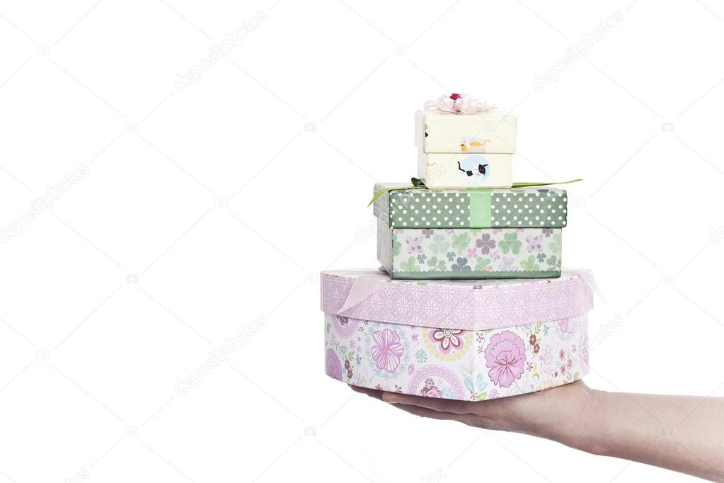 Hand giving with gifts (Horizontal image)