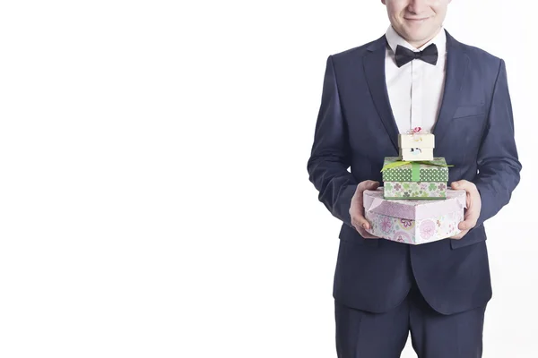 Business man with gifts (horizontal image) — Stock Photo, Image