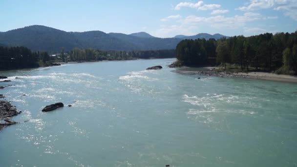 View from the suspension bridge over the river Katun. — Stock Video