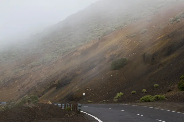 Highway road with line in Timanfaya, Lanzarote. Spain. Way to volcano — Stock Photo, Image