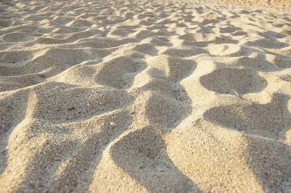 Hintergrund aus Sand am Strand — Stockfoto