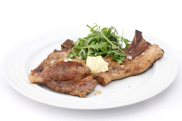 Schweinefleisch-T-Bone-Steak mit einfachem Salat — Stockfoto