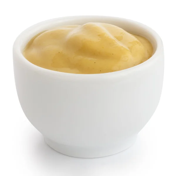 Smooth mustard in white ceramic ramekin. — Stock Photo, Image