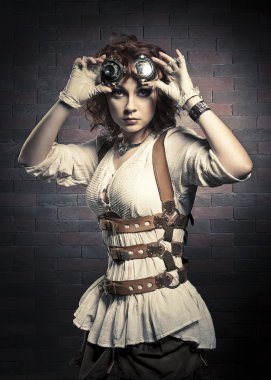 Dişileştirilmiş kız ile steampunk koruyucu gözlük