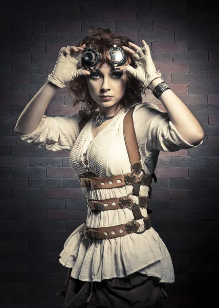 Redhair girl with steampunk goggles — Stock Photo, Image