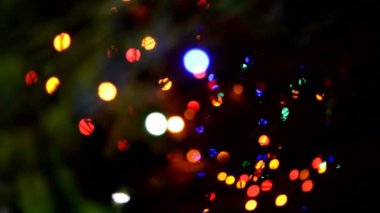 Siyah bir arkaplanda çok renkli soyut bokeh arkaplanı. Yaratıcı tasarım.