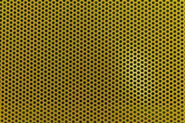 Yuvarlak delikleri ve deseni olan metal sarı ağ.