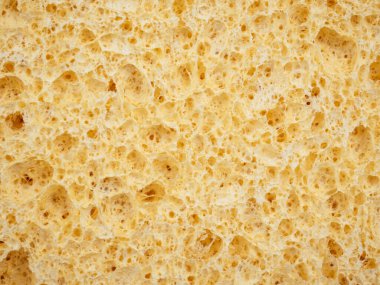 Kozmetik sünger dokusu arka planı. Doğal renk temizleme malzemesi detayı. Yaklaş, makro manzara. Bulaşık yıkama ya da güzellik bakımı.