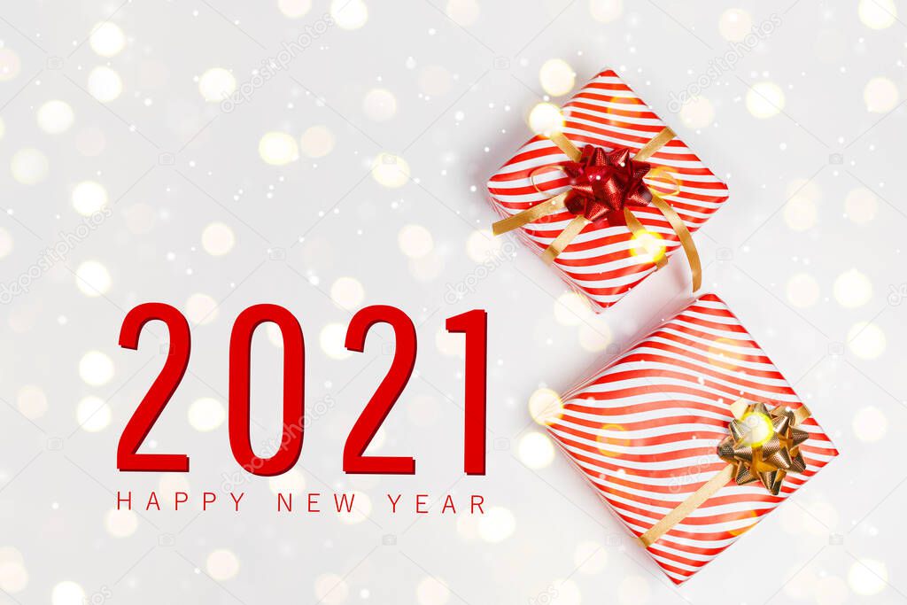 2021 happy new year and christmas horizontal composition with christmas gift boxes decor on a light background