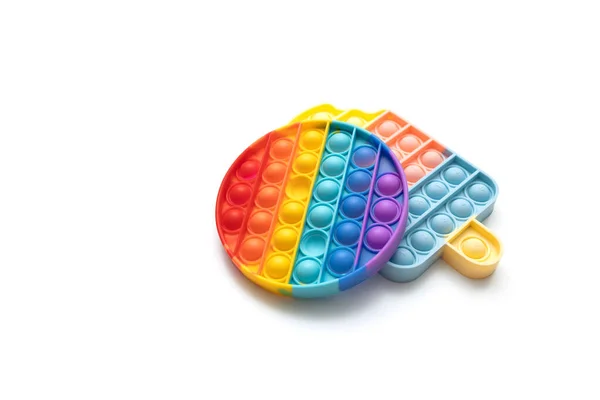 Красочный анти-стресс Fidget толчок поп это сенсорные игрушки изолированы на белом фоне. — стоковое фото