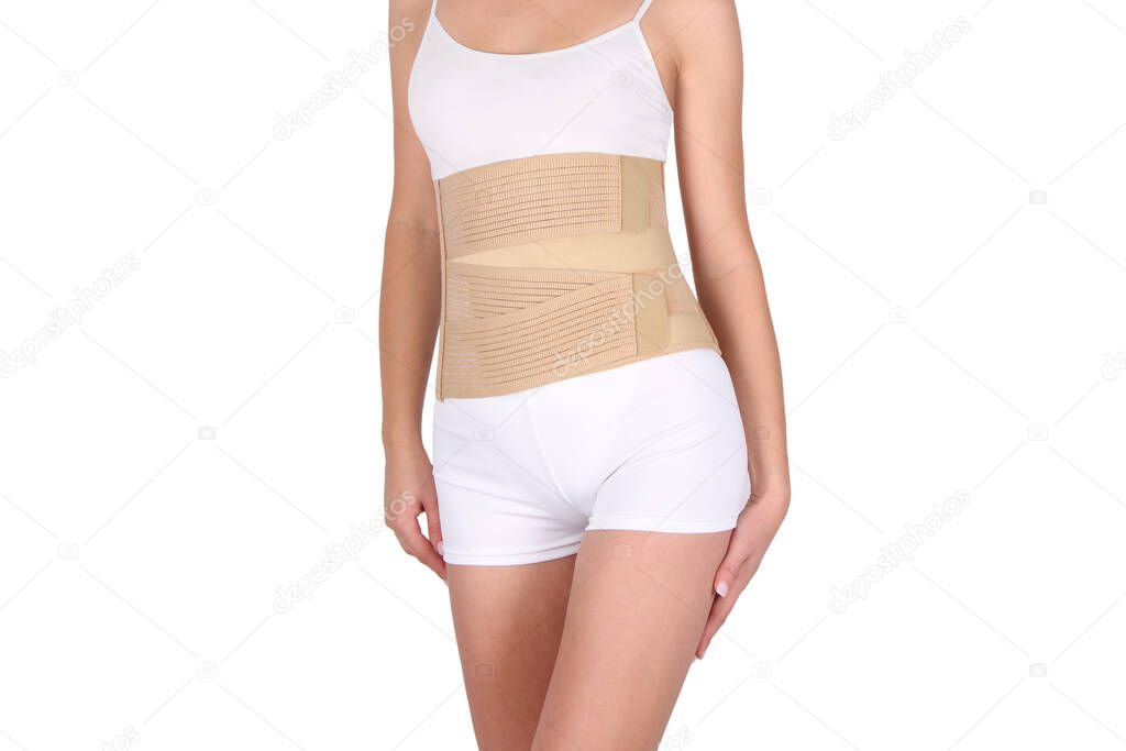 Orthopedic lumbar corset on the human body. Back brace, waist support belt for back. Posture Corrector For Back Clavicle Spine. Post-operative Hernia Pregnant and Postnatal Lumbar brace after surgery.
