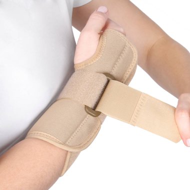 Elastik bilek bandajı. Ortopedik tıbbi kondisyon bandajı. Elastik bilek sakatlama desteği. Spor Koruyucu Bileklik beyaz arka planda izole edildi. Bilek Konumu Ortozu. Bilek ağrısı..