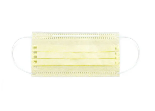 黄色防护面罩 可处置的医疗面罩隔离在白色背景特写 Covid 电晕病毒和流感防护概念 专业外科设备 — 图库照片