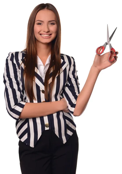 Office girl showing scissors isolated on a white background — Stock Photo, Image