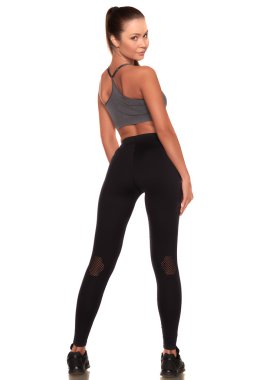 Fitness kadın spor stil ayakta izole beyaz arka plan karşı