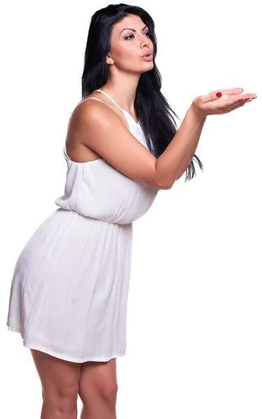 Jonge vrouw in een witte zomerjurk geïsoleerd over Wit — Stockfoto