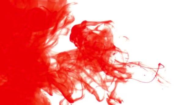 Blue, green, yellow and red ink in water — Stock Video