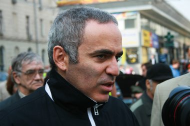 Politician Garry Kasparov at the memorial meeting in Moscow on the anniversary of the terrorist attack on a school in Beslan clipart