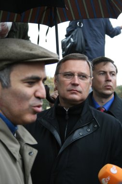 Politician Garry Kasparov interview after the rally in memory of Anna Politkovskaya clipart