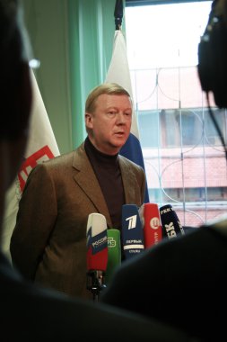 Moscow region, Russia - November 15, 2008. Politician Anatoly Chubais and explain to journalists the necessity of the dissolution of the party Union of Right Forces