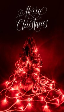 Noel kartı, pankart, düz yatak, mesaj- Mutlu Noeller. Işık bulanıklığı