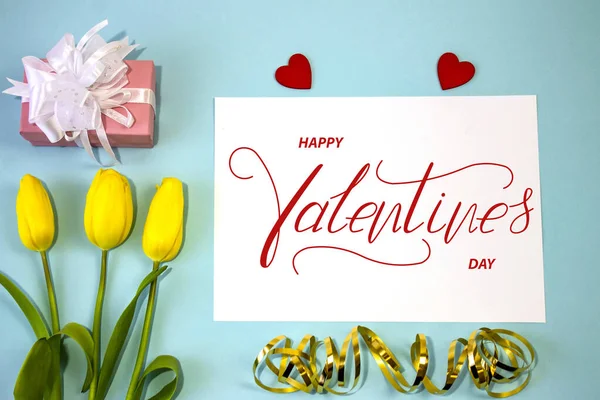Happy Valentine's day! Card, online banner, greeting card, Flat lay on Valentine's Day, on a blue background