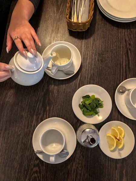 stock image tea at wooden table