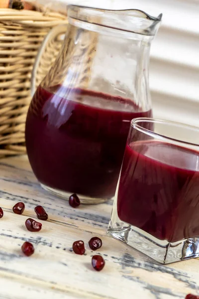 Pomegranates Basket Table Wooden Background Pomegranate Juice Jug Glass — Stock Photo, Image