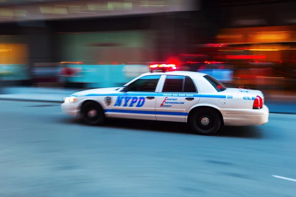 Rendőrségi autó a NYPD Manhattan-ben, NYC, a motion blur — Stock Fotó