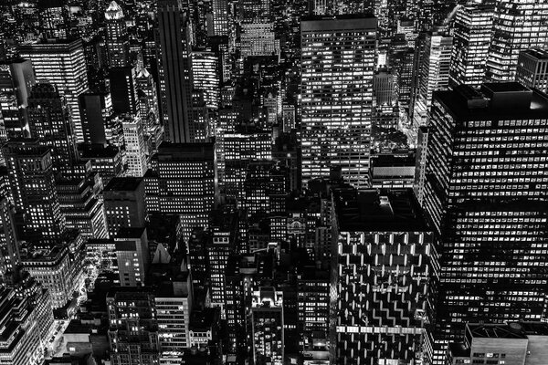 Black and white picture with an aerial view of Manhattan, NYC, at night