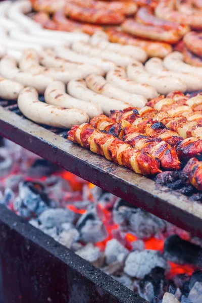 Bratwurst on a large grill — Stock Photo, Image