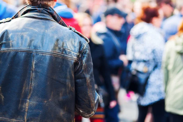 Man in a crowd of people — Stock Photo, Image