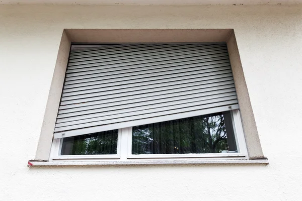 broken window blind