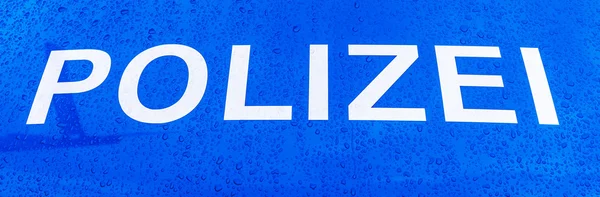 Wortpolizei auf einem deutschen Polizeiauto — Stockfoto