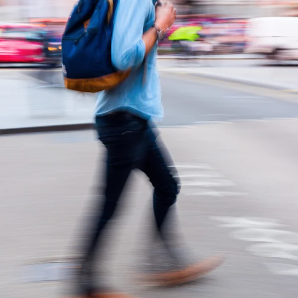 Walking man in motion blur — Stock Photo, Image